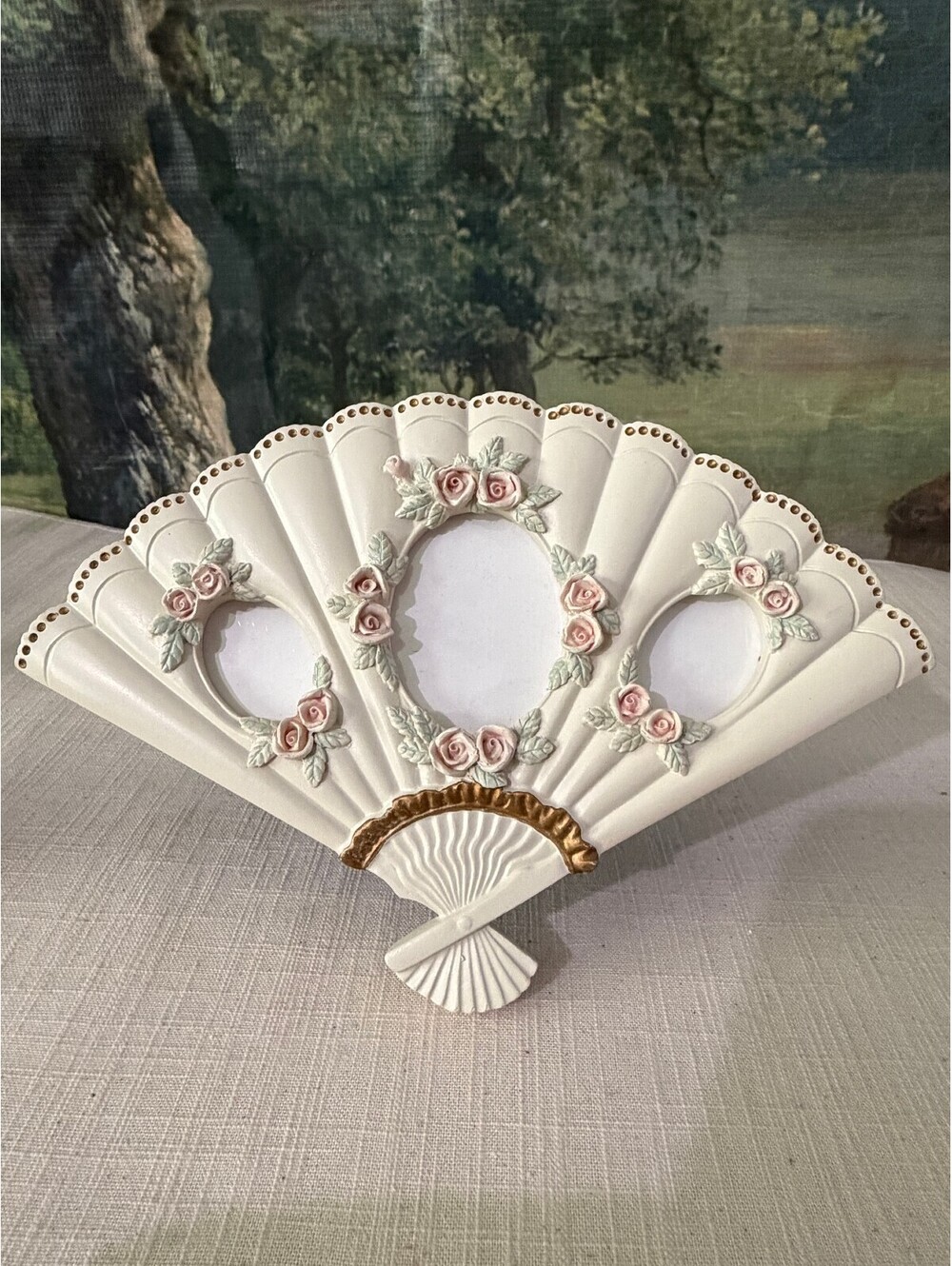 Fan shaped floral triple opening picture frame